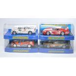 Scalextric slot car issues comprising Jaguar XKR GT3, BMW 320si WTCC, Ford Focus RS WRC (cracks to