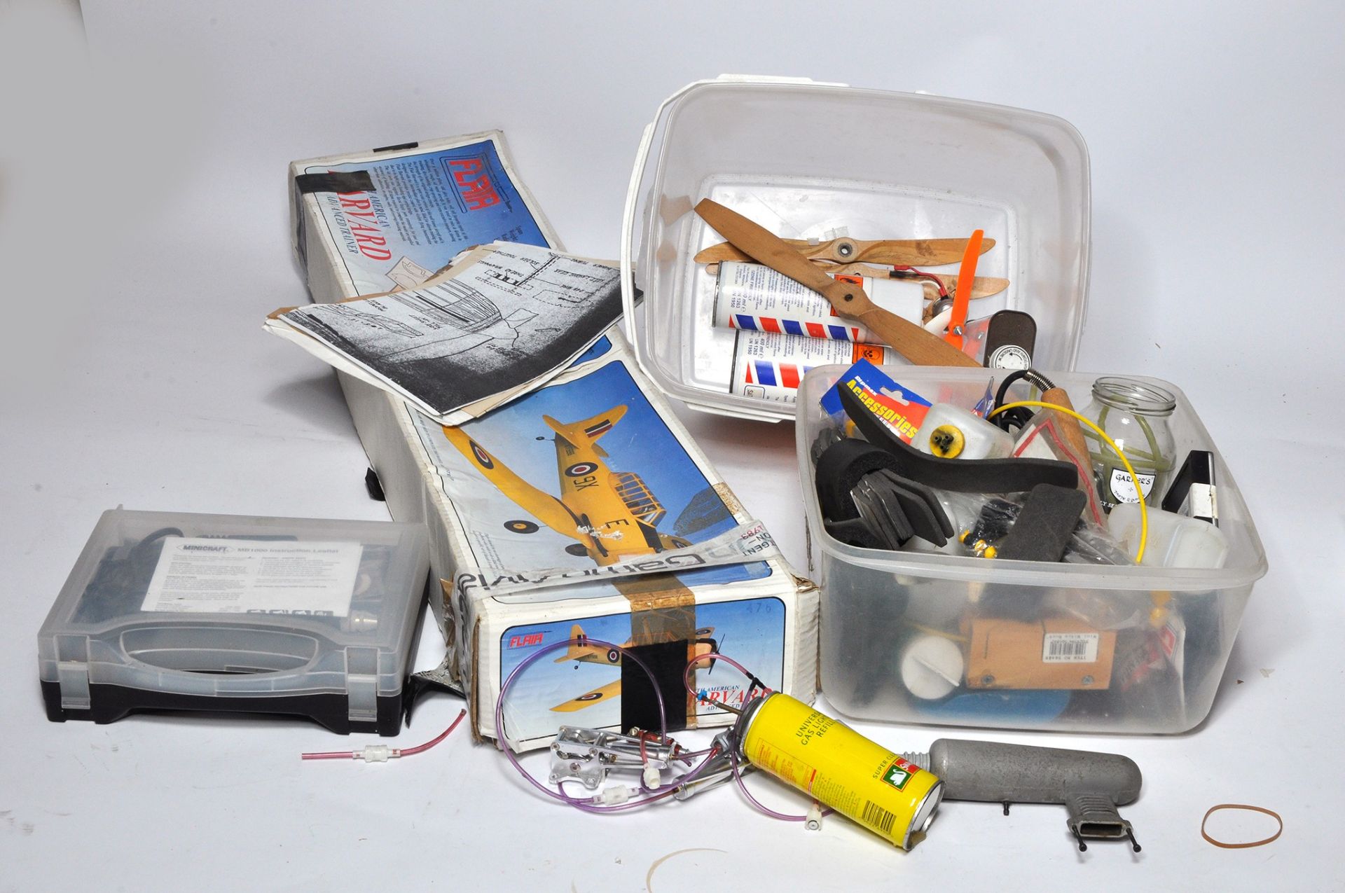 An assortment of aircraft modelling accessories, tools and spares including kit for spares
