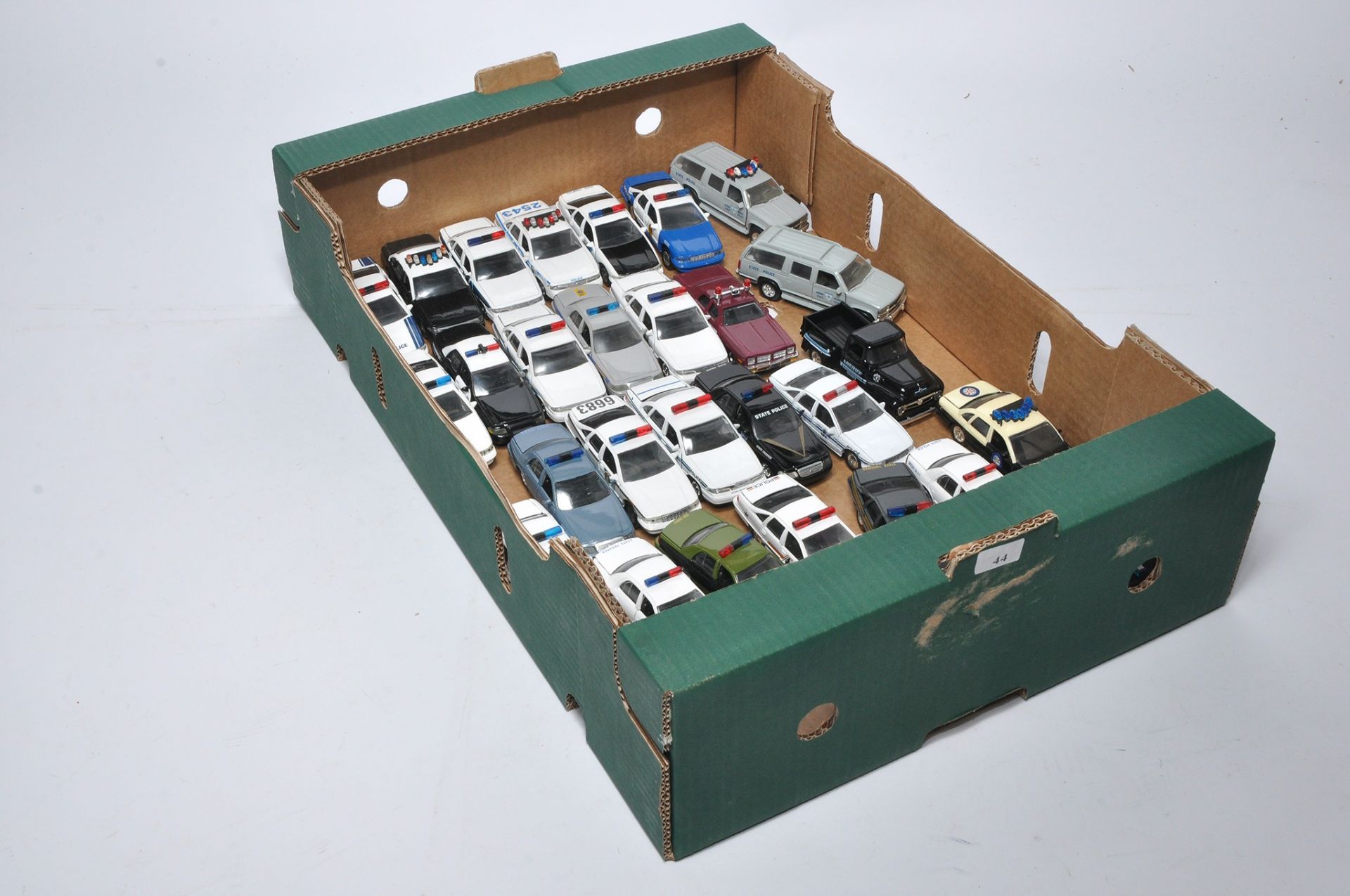 A tray of American Diecast Police Vehicles in various state liveries as shown.