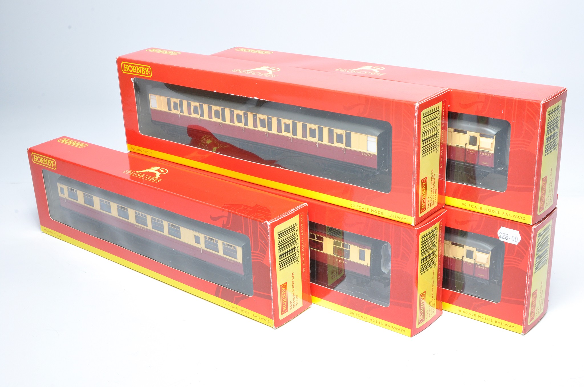 Hornby Model Railway comprising five coaches in Crimson Cream. All look to be without fault in boxes