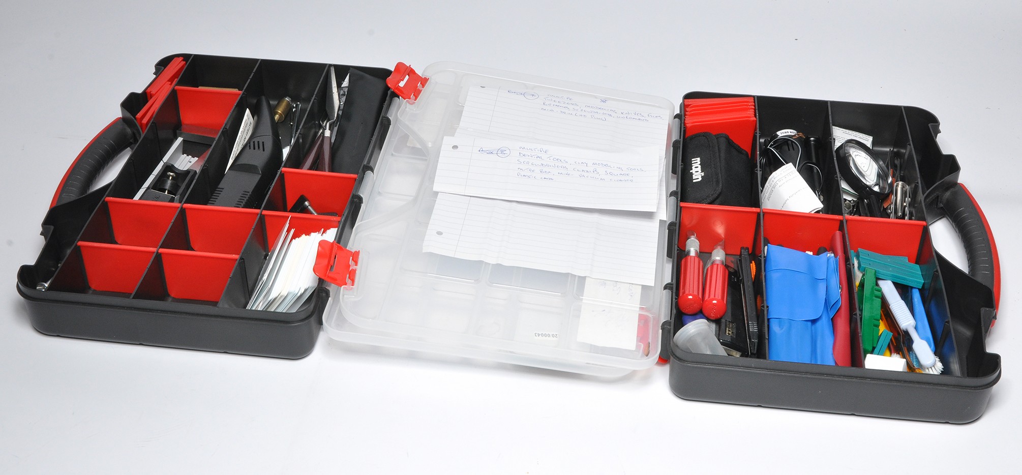 Modelling Tools and Accessories as shown, contained in two cases.