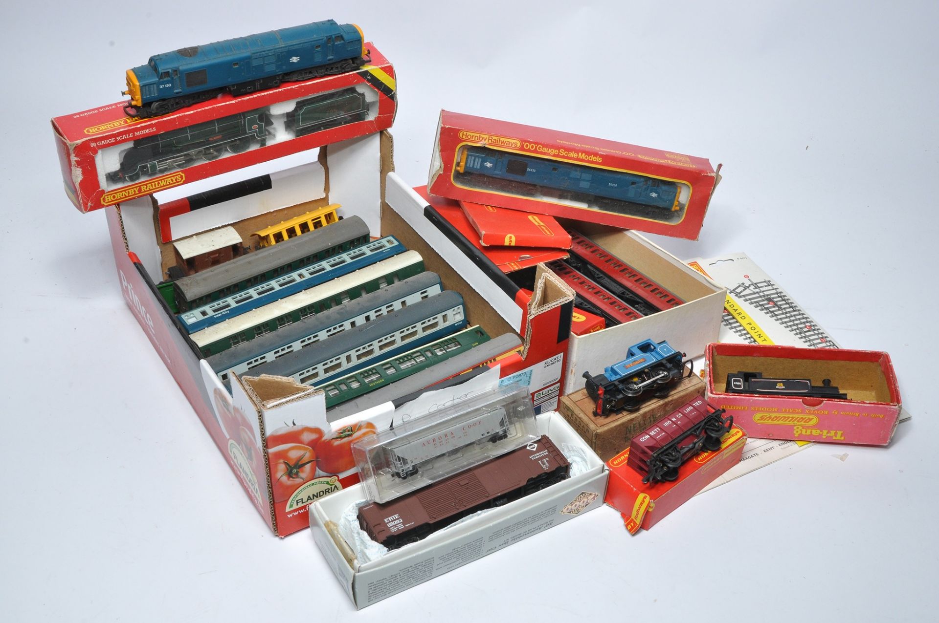 An assortment of various model railway issues including locomotives, rolling stock and track items