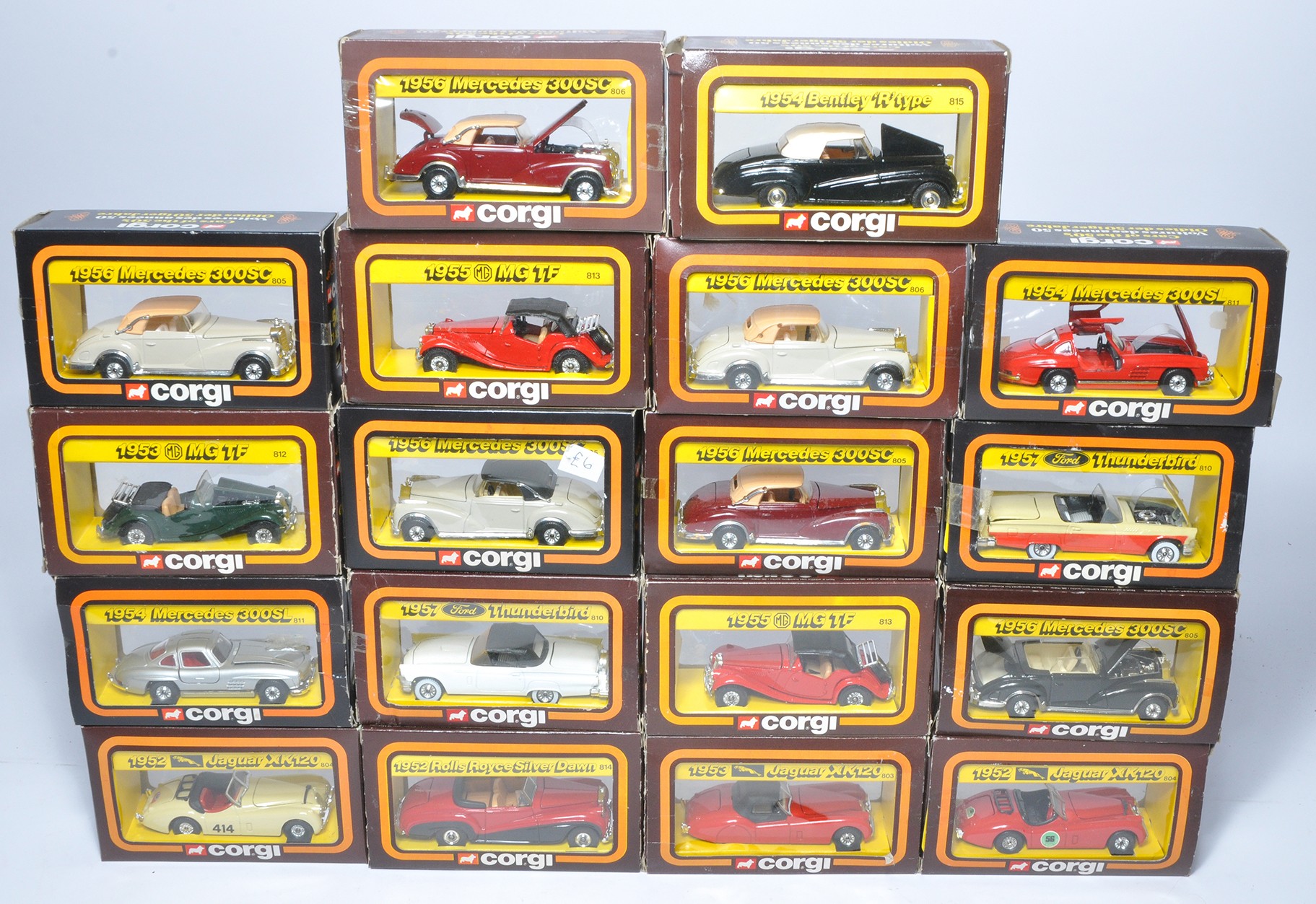 A group of Eighteen 50's Corgi Diecast Model Car Issues as shown. Mostly Excellent in boxes. Some