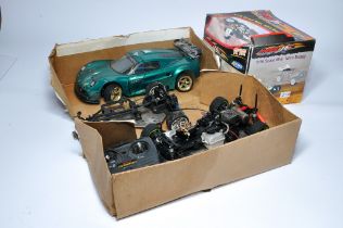 A group of High Performance Radio Control Car items including car chassis and shells and other items