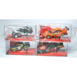 A group of four SCX slot car issues comprising Fiat 124 Spyder, Texaco/Havoline Dodge Charger,