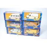 A group of six diecast model vehicles from Corgi comprising 1980/90's issue Ford Transit Vans in