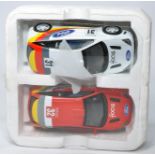 Scalextric slot car set Ford Focus no. 31 and 32 - good condition, in packaging - no box.
