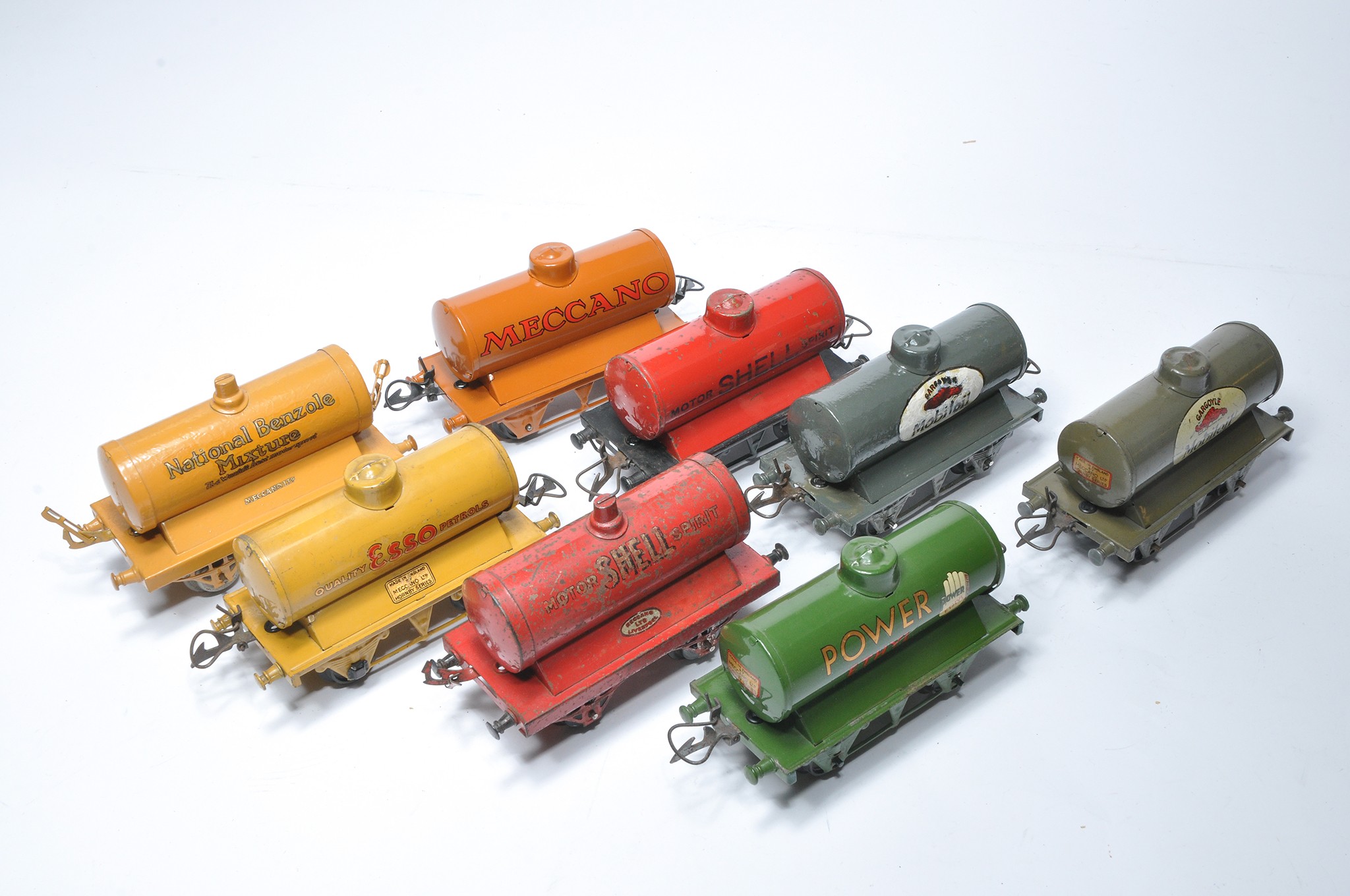 Hornby O Gauge Model Railway group of Eight Tank Wagons with various liveries as shown.