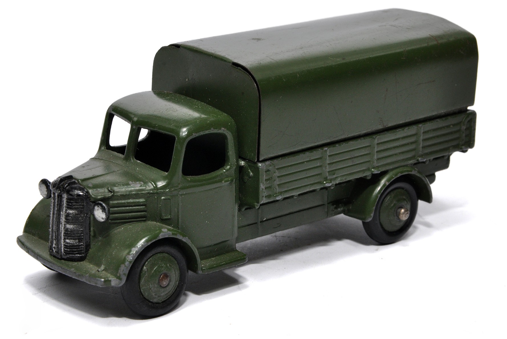 Dinky No. 30SM (Export) Austin Covered Wagon, in military green. Displays good to very good.