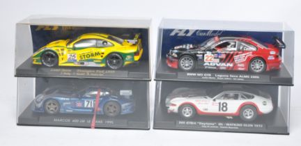 Fly slot car issues comprising Marcos 600 Le Mans 1995, Lister Storm Donington Park 1999, 365 GTB/