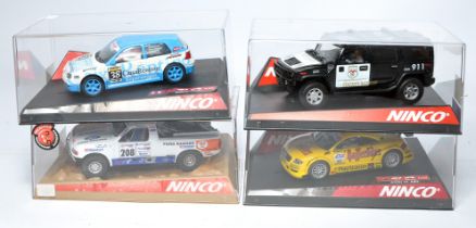 A group of four Ninco slot car issues comprising Audi TT ABT, Hummer H2 County Sheriff, Pro Truck '