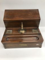 A 19th Century mahogany book press, the brass screw handle stamped "S Morden & Co.