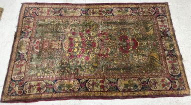 A fine silk Kashan rug,