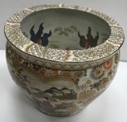 A Satsuma carp bowl / jardiniere decorated with two panels depicting figures in a landscape,