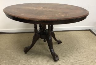 A Victorian walnut and marquetry inlaid oval loo table, on quadruple cluster column base,