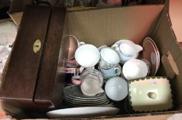 Four boxes of assorted china and glassware to include water jug, various drinking glasses,