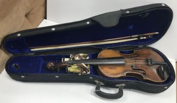 A 19th Century Bavarian violin with carved lion head stock,