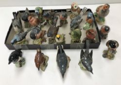 A collection of 20 various Beswick bird figurines to include "Barn Owl", "Kingfisher",