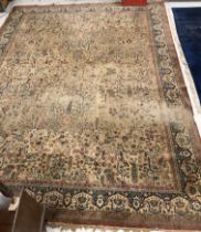 A large Persian pattern Wilton carpet,