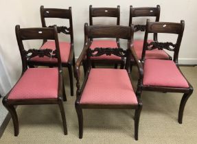 A collection of thirteen various 19th Century bar back dining chairs including a pair of scroll arm
