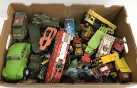 A box containing assorted playworn Dinky and Corgi toys to include Pink Panther,