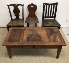 Two 18th Century oak panel seated dining chairs and a Continental oak and walnut panel seated hall