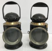 Two GWR railway signal lamps, one bearing label inscribed "J.H. Hetherington & Co.