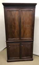 A 19th Century mahogany free standing corner cupboard,