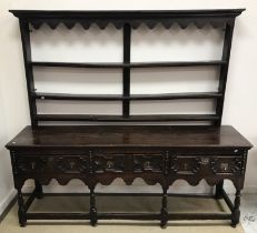 A 17th Century and later oak dresser,