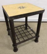 Two Moroccan cast iron framed marble top occasional tables on turned supports united by lattice