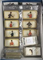 A collection of various cigarette cards depicting jockeys, racing,
