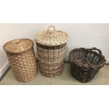 A cane lidded linen basket, 80 cm high including handle,