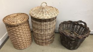 A cane lidded linen basket, 80 cm high including handle,