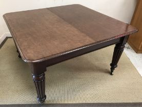 A Victorian mahogany dining table,