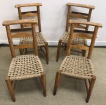 A set of four beech framed rush seated chapel style chairs (4)