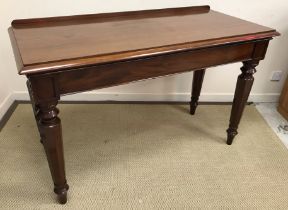 A Victorian mahogany serving table, the plain top with applied moulded edge over a plain frieze,
