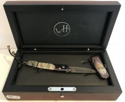 A William Henry Studio folding pocket knife, model B10, wave pattern blade,