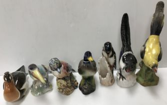 A collection of various assorted bird figurines to include a Lomonsov goose, 12.