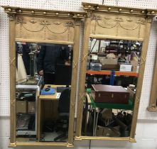 A pair of modern Regency style gilt framed pier glasses with ribbon and harebell swag decoration,