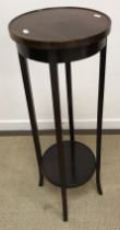 A collection of small furniture to include two mahogany pedestal tripod plant or torchere stands,