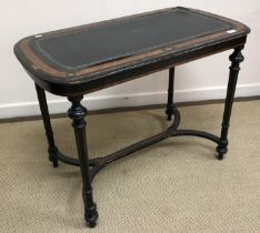 A Victorian ebonised and amboyna banded writing table,