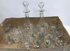A collection of glassware to include two cut glass onion shaped decanters,