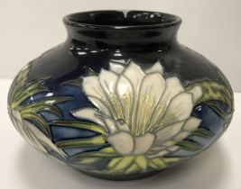 A Moorcroft "Queen of the Night" squat vase by Anji Davenport, signed to base, 11.