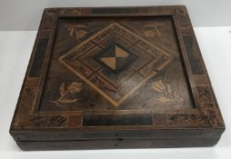A 19th Century games box with chess board to base and backgammon to interior 34.6 cm square x 6.