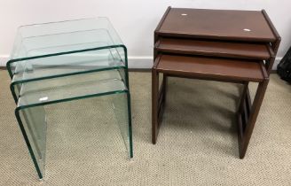 A nest of three modern graduated moulded glass occasional tables in the manner of Alessandro Alessi,