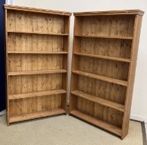 A pair of modern pine open bookcases 106 cm wide x 24 cm deep x 182.