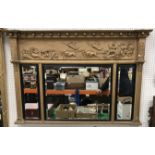 A Victorian giltwood and gesso framed overmantel mirror,