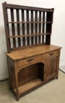 An Arts & Crafts oak dresser,