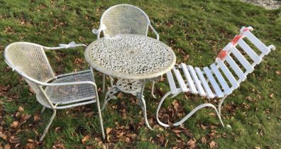 A painted aluminium garden table and two chairs,