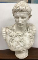 A large painted plaster bust of "Augustus in armour", raised on a socle base,